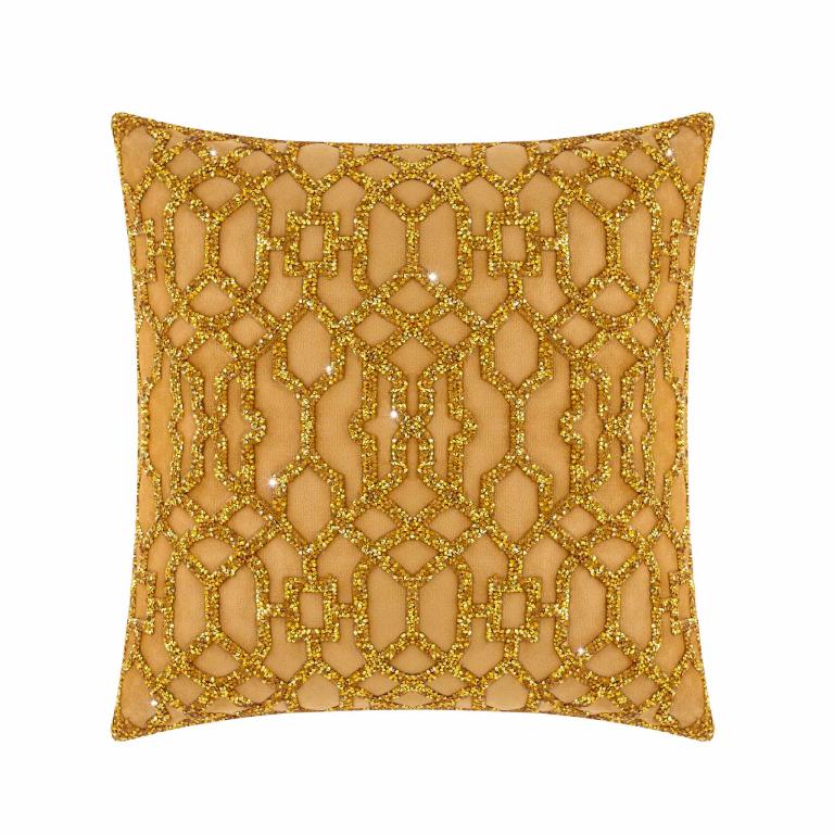 Square pillow in gold velvet with laser-cut rhinestone lattice pattern plush texture and smooth edges.