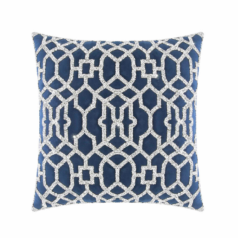 Navy pillow with laser-cut rhinestone lattice pattern on a plush velvet surface featuring a smooth texture and square shape.