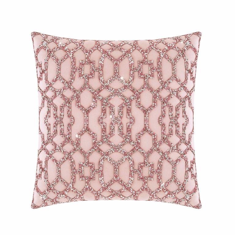 Pink velvet pillow with laser-cut rhinestones in a geometric pattern featuring a plush texture and a square shape.