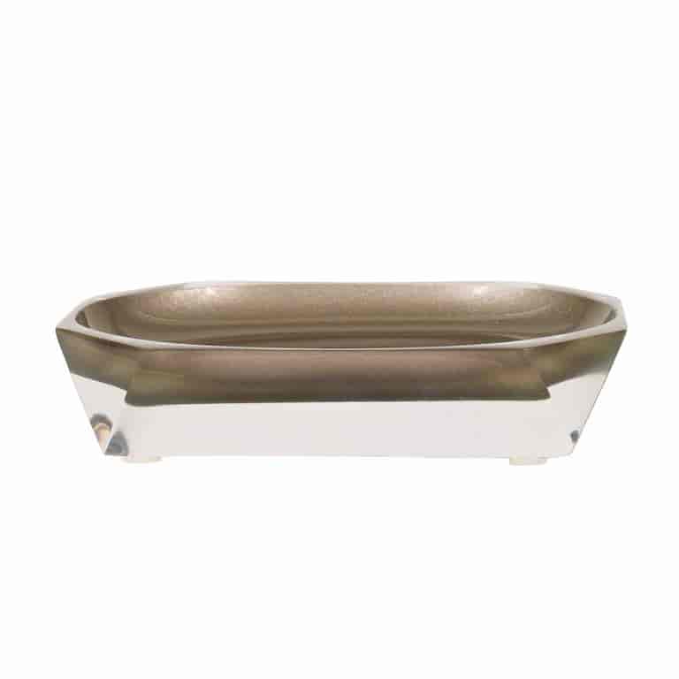 Faceted rectangular soap dish with a bronze interior and clear resin exterior featuring angled edges and a glossy finish.