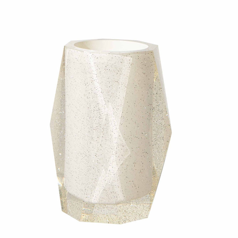 Faceted tumbler in translucent white with silver glitter featuring a geometric shape and smooth shiny surface.