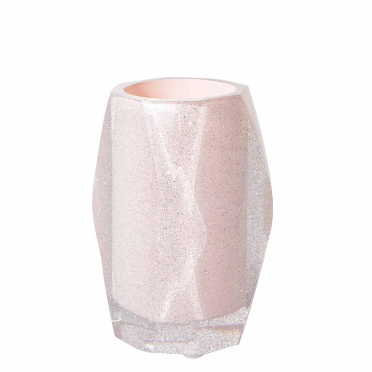 Faceted tumbler in light pink with a glittery textured exterior and smooth inner surface featuring an angular shape.