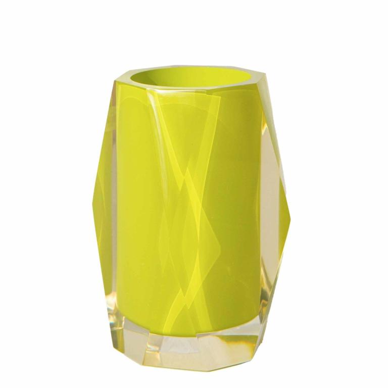 Faceted yellow tumbler with a glossy finish featuring angular edges and a clear base reflecting light in a vibrant manner.