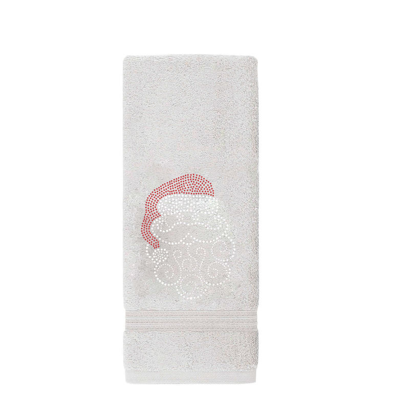 White cotton hand towel with a sparkling Santa motif red hat and decorative white rhinestone accents on a textured surface.