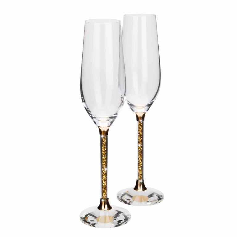Clear crystal toasting flute with a gold stem featuring a gold glitter fill gold base and a smooth polished finish.