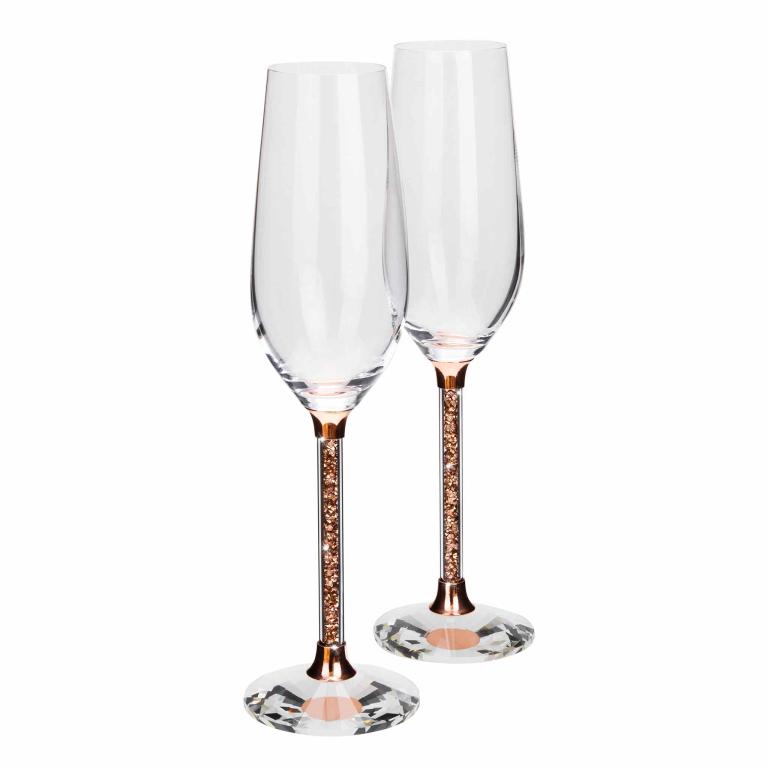 Clear crystal toasting flute with a rose gold stem filled with small rose gold beads and a faceted clear glass base.