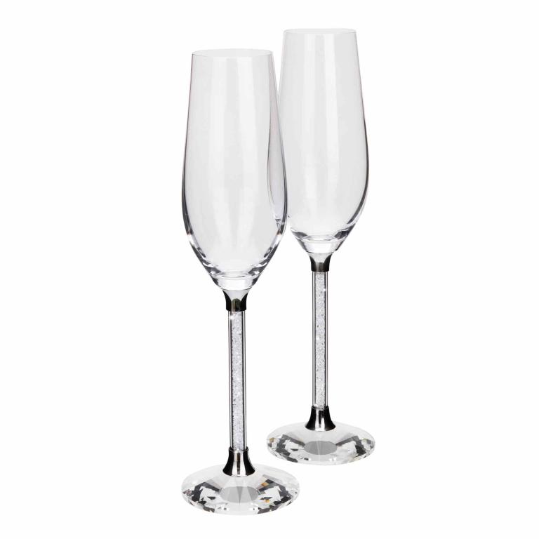 Clear crystal toasting flute with a textured silver stem and a round faceted base measures 10 inches tall and 3 inches wide.