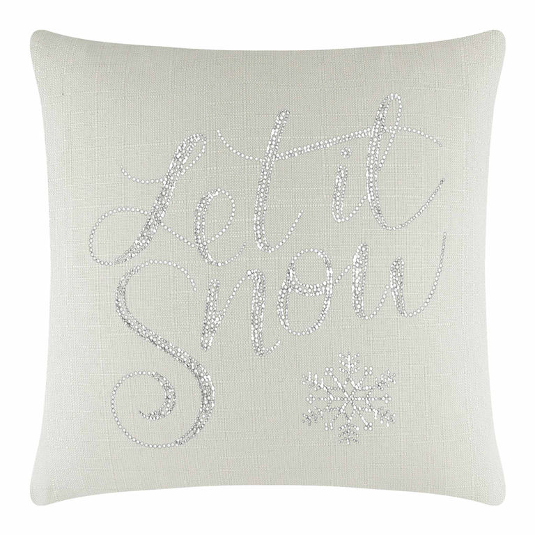 Square&#x20;linen&#x20;pillow&#x20;in&#x20;light&#x20;beige&#x20;with&#x20;silver&#x20;glass&#x20;rhinestones&#x20;spelling&#x20;&quot;Let&#x20;it&#x20;Snow&quot;&#x20;and&#x20;a&#x20;snowflake&#x20;design.