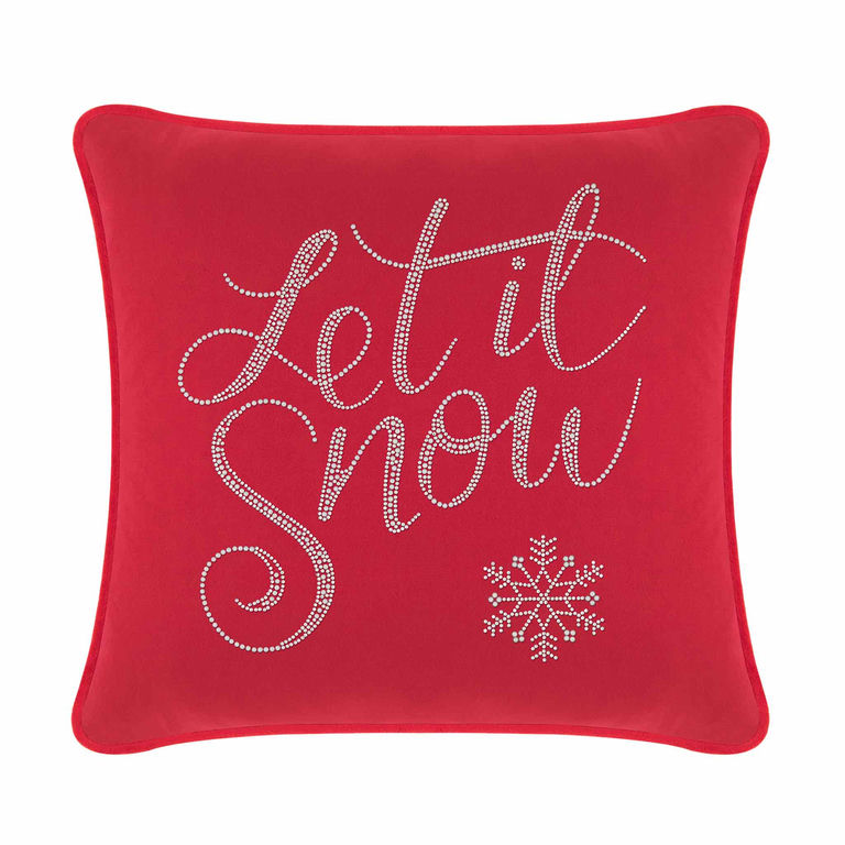 Red velvet pillow featuring "Let it Snow" in glass rhinestones with a snowflake design in the bottom corner.