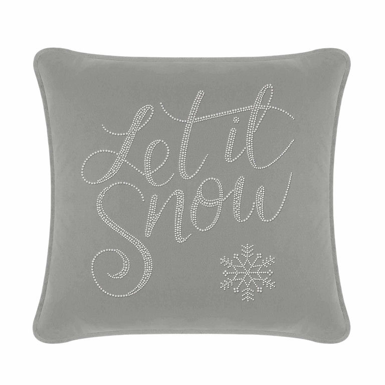 Silver velvet pillow featuring "Let it Snow" in glass rhinestones with a snowflake design and a piped edge.