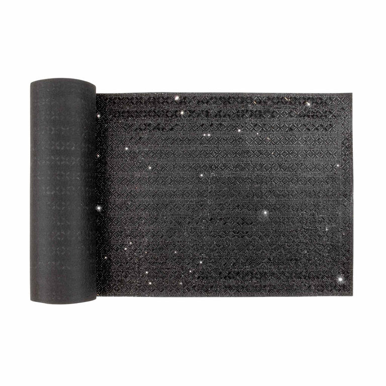 Black table runner with a textured surface embellished with glass rhinestones in an X-pattern featuring a wavy edge.