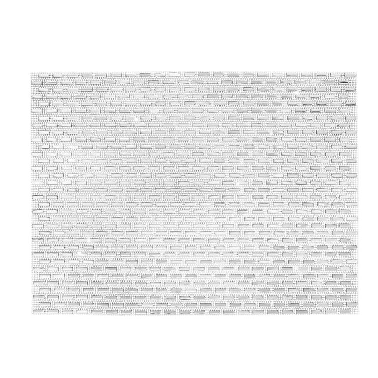 Silver placemat with a subway tile design adorned with glass stones featuring a felt backing and a textured surface.