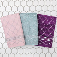 Textures That Feel Like Spring 🌷⁠ ⁠ Soft terry towels, an aqua velvet pillow, and lavender lattice pearl accents. Light, airy, and made for the season.⁠ Design Credit: @sandraleestylez⁠