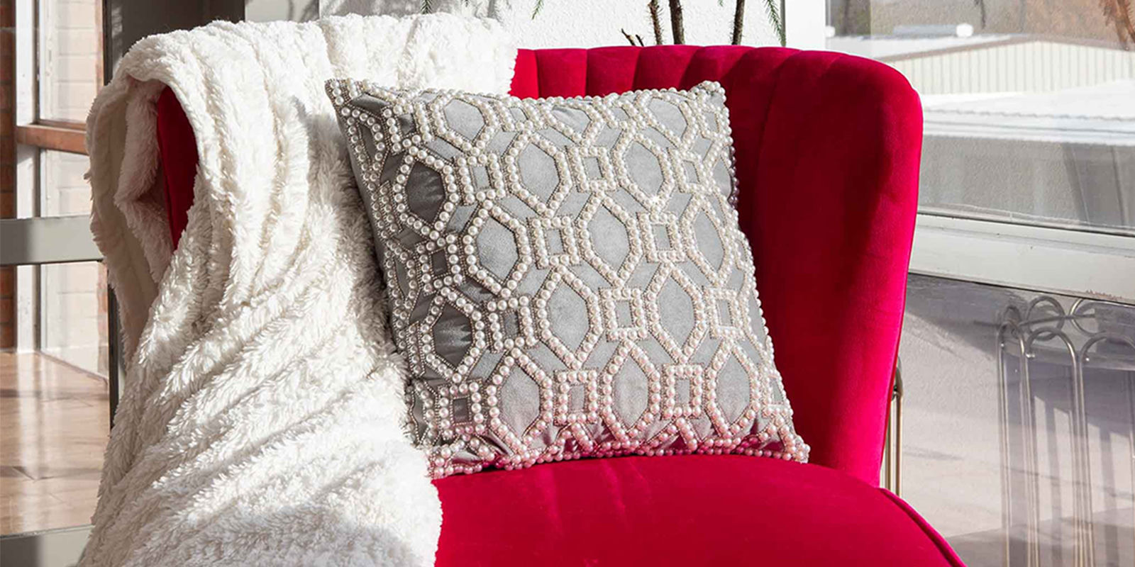 Silver&amp;&#x23;x20&#x3B;lattice&amp;&#x23;x20&#x3B;accent&amp;&#x23;x20&#x3B;pillow&amp;&#x23;x20&#x3B;on&amp;&#x23;x20&#x3B;a&amp;&#x23;x20&#x3B;pink&amp;&#x23;x20&#x3B;velvet&amp;&#x23;x20&#x3B;chair&amp;&#x23;x20&#x3B;with&amp;&#x23;x20&#x3B;a&amp;&#x23;x20&#x3B;white&amp;&#x23;x20&#x3B;throw