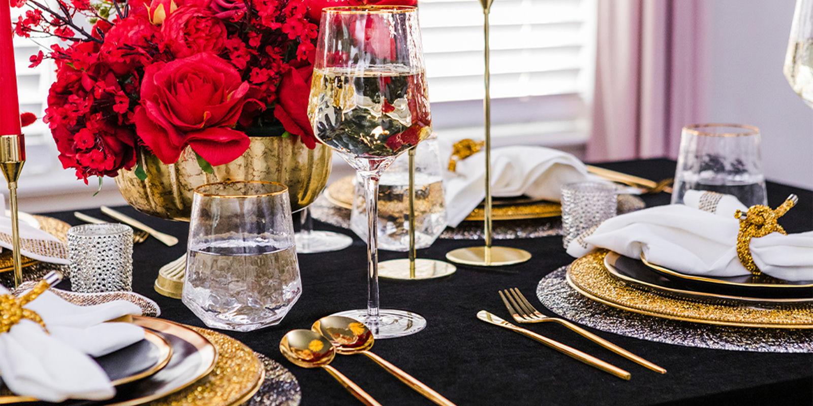 Close-up&amp;&#x23;x20&#x3B;of&amp;&#x23;x20&#x3B;a&amp;&#x23;x20&#x3B;black&amp;&#x23;x20&#x3B;and&amp;&#x23;x20&#x3B;gold&amp;&#x23;x20&#x3B;table&amp;&#x23;x20&#x3B;setting&amp;&#x23;x20&#x3B;with&amp;&#x23;x20&#x3B;wine&amp;&#x23;x20&#x3B;glasses&amp;&#x23;x20&#x3B;and&amp;&#x23;x20&#x3B;rhinestone&amp;&#x23;x20&#x3B;accents