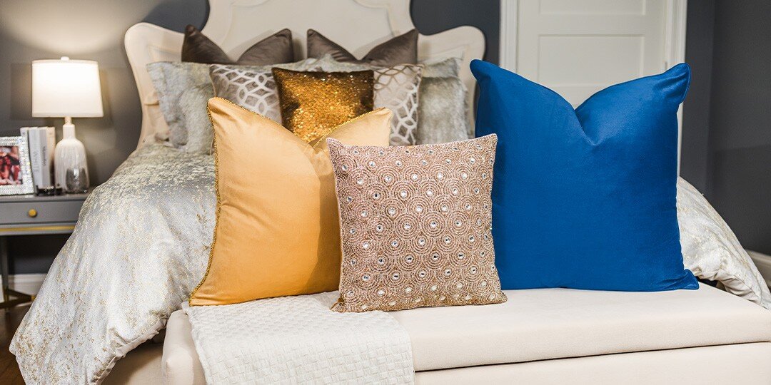 Colorful&amp;&#x23;x20&#x3B;velvet&amp;&#x23;x20&#x3B;throw&amp;&#x23;x20&#x3B;pillows&amp;&#x23;x20&#x3B;in&amp;&#x23;x20&#x3B;gold,&amp;&#x23;x20&#x3B;blue&amp;&#x23;x20&#x3B;and&amp;&#x23;x20&#x3B;rhinestone&amp;&#x23;x20&#x3B;patterns&amp;&#x23;x20&#x3B;on&amp;&#x23;x20&#x3B;bed&amp;&#x23;x20&#x3B;for&amp;&#x23;x20&#x3B;mixing&amp;&#x23;x20&#x3B;textures