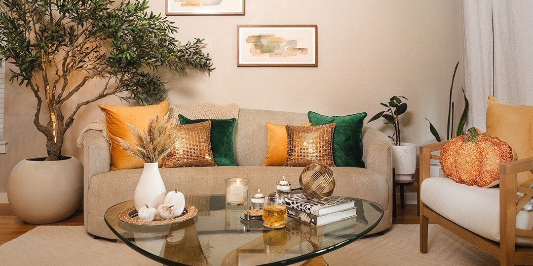 neutral&amp;&#x23;x20&#x3B;glam&amp;&#x23;x20&#x3B;living&amp;&#x23;x20&#x3B;room&amp;&#x23;x20&#x3B;with&amp;&#x23;x20&#x3B;gold&amp;&#x23;x20&#x3B;and&amp;&#x23;x20&#x3B;emerald&amp;&#x23;x20&#x3B;pillows&amp;&#x23;x20&#x3B;and&amp;&#x23;x20&#x3B;rhinestone&amp;&#x23;x20&#x3B;pumpkin&amp;&#x23;x20&#x3B;accent