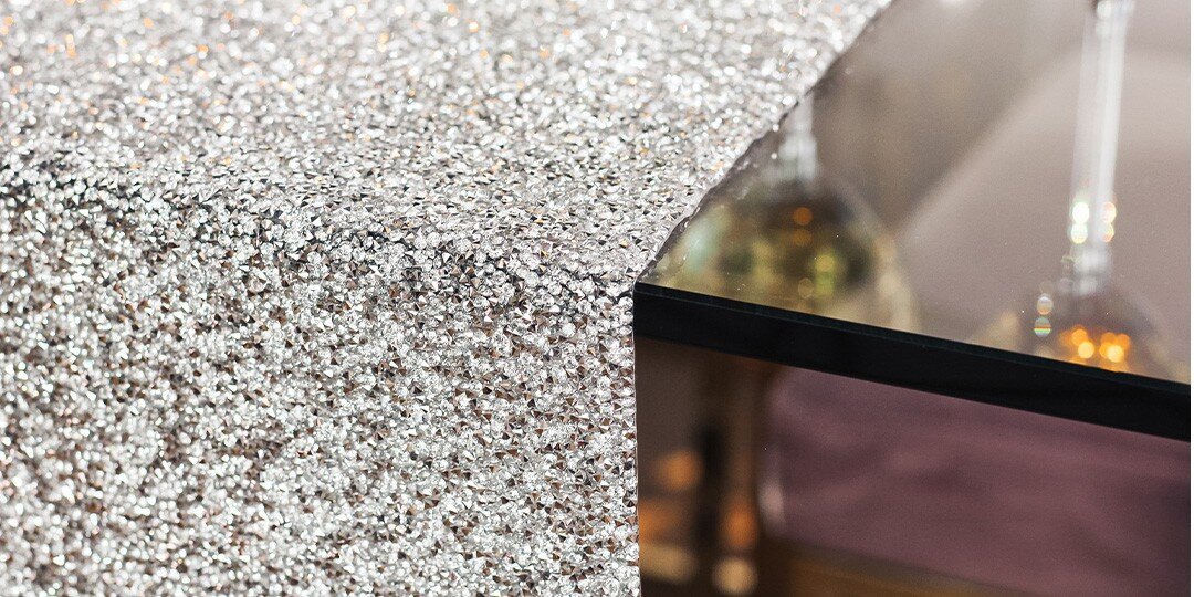 A&amp;&#x23;x20&#x3B;detailed&amp;&#x23;x20&#x3B;close-up&amp;&#x23;x20&#x3B;view&amp;&#x23;x20&#x3B;showcasing&amp;&#x23;x20&#x3B;the&amp;&#x23;x20&#x3B;intricate&amp;&#x23;x20&#x3B;texture&amp;&#x23;x20&#x3B;of&amp;&#x23;x20&#x3B;silver&amp;&#x23;x20&#x3B;rhinestones.&amp;&#x23;x20&#x3B;The&amp;&#x23;x20&#x3B;sparkly&amp;&#x23;x20&#x3B;surface&amp;&#x23;x20&#x3B;catches&amp;&#x23;x20&#x3B;and&amp;&#x23;x20&#x3B;reflects&amp;&#x23;x20&#x3B;light,&amp;&#x23;x20&#x3B;creating&amp;&#x23;x20&#x3B;a&amp;&#x23;x20&#x3B;glamorous,&amp;&#x23;x20&#x3B;textured&amp;&#x23;x20&#x3B;pattern.&amp;&#x23;x20&#x3B;A&amp;&#x23;x20&#x3B;dark&amp;&#x23;x20&#x3B;reflective&amp;&#x23;x20&#x3B;surface&amp;&#x23;x20&#x3B;is&amp;&#x23;x20&#x3B;partially&amp;&#x23;x20&#x3B;visible&amp;&#x23;x20&#x3B;in&amp;&#x23;x20&#x3B;the&amp;&#x23;x20&#x3B;soft-focus&amp;&#x23;x20&#x3B;background.