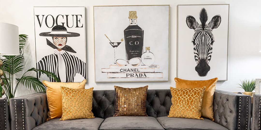 Living&amp;&#x23;x20&#x3B;room&amp;&#x23;x20&#x3B;featuring&amp;&#x23;x20&#x3B;gold&amp;&#x23;x20&#x3B;throw&amp;&#x23;x20&#x3B;pillows&amp;&#x23;x20&#x3B;and&amp;&#x23;x20&#x3B;glam&amp;&#x23;x20&#x3B;wall&amp;&#x23;x20&#x3B;art&amp;&#x23;x20&#x3B;with&amp;&#x23;x20&#x3B;fashion&amp;&#x23;x20&#x3B;and&amp;&#x23;x20&#x3B;animal&amp;&#x23;x20&#x3B;prints