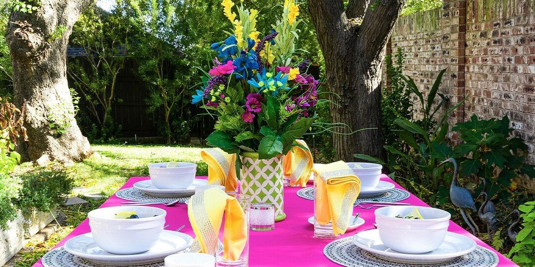 bright&amp;&#x23;x20&#x3B;outdoor&amp;&#x23;x20&#x3B;garden&amp;&#x23;x20&#x3B;tablescape&amp;&#x23;x20&#x3B;with&amp;&#x23;x20&#x3B;hot&amp;&#x23;x20&#x3B;pink&amp;&#x23;x20&#x3B;tablecloth,&amp;&#x23;x20&#x3B;yellow&amp;&#x23;x20&#x3B;napkins,&amp;&#x23;x20&#x3B;and&amp;&#x23;x20&#x3B;colorful&amp;&#x23;x20&#x3B;floral&amp;&#x23;x20&#x3B;centerpiece