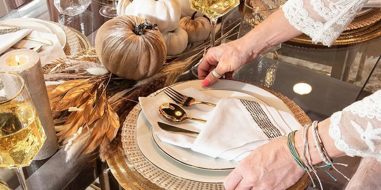 close-up of rhinestone napkin and velvet pumpkin centerpiece on a glam table