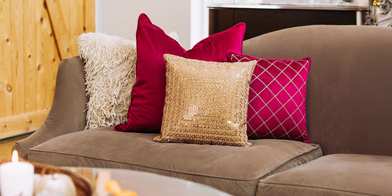 Gold&amp;&#x23;x20&#x3B;beaded&amp;&#x23;x20&#x3B;pillow&amp;&#x23;x20&#x3B;layered&amp;&#x23;x20&#x3B;with&amp;&#x23;x20&#x3B;red&amp;&#x23;x20&#x3B;velvet&amp;&#x23;x20&#x3B;and&amp;&#x23;x20&#x3B;patterned&amp;&#x23;x20&#x3B;pillows&amp;&#x23;x20&#x3B;on&amp;&#x23;x20&#x3B;neutral&amp;&#x23;x20&#x3B;sofa